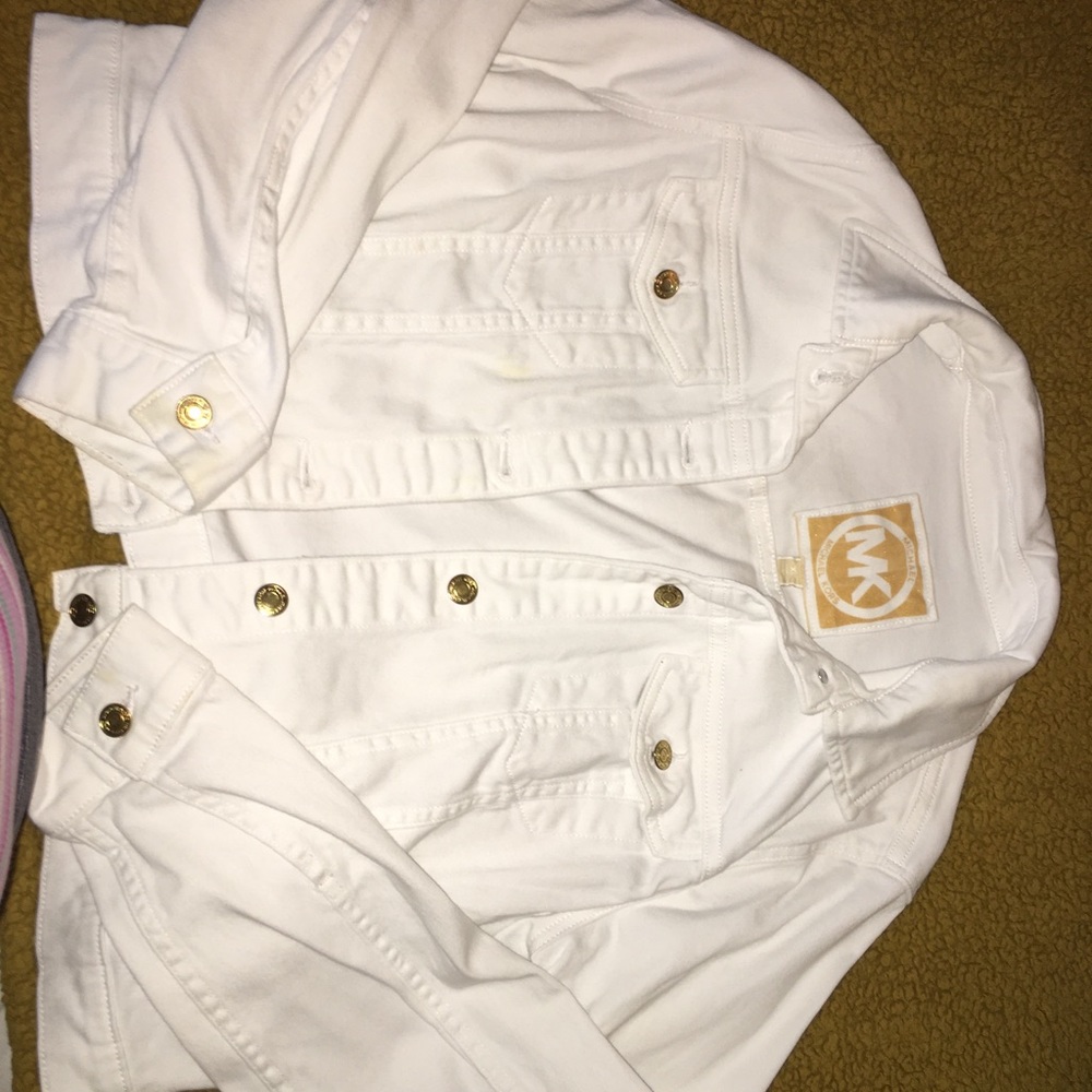 MK white jean jacket.
